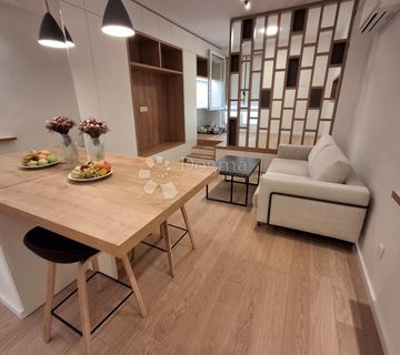 Dizajnerski studio apartman u poslovnom centru Raba!!! Samo kod nas! - cover