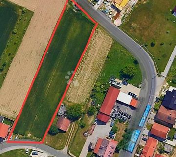 PARCELA U M1 ZONI SA IZLAZOM NA DVIJE ULICE - cover