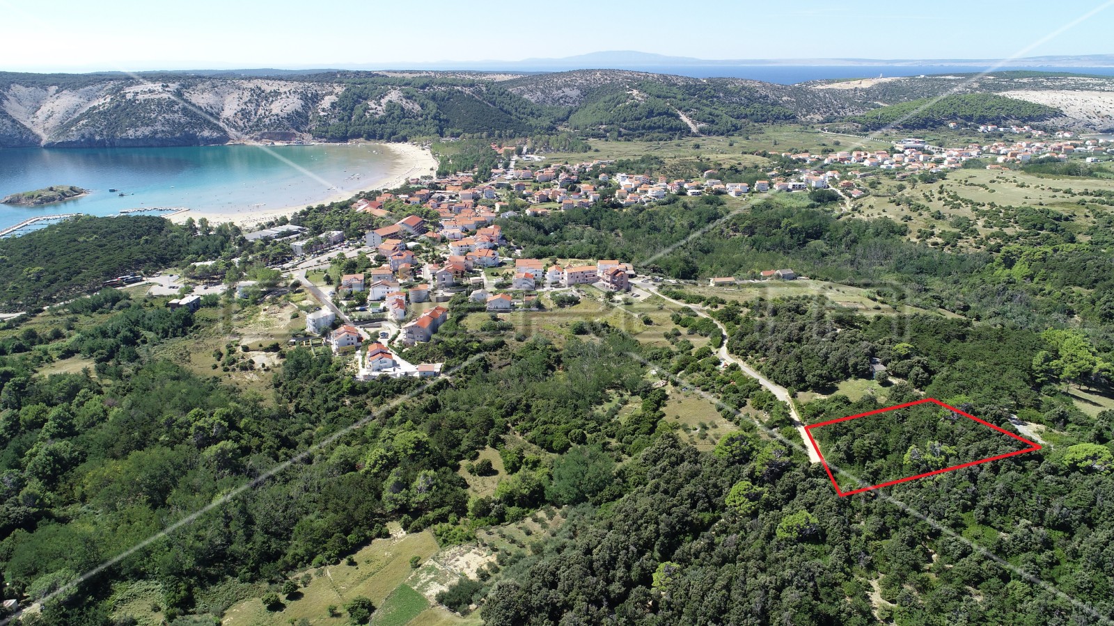 Građevinsko zemljište s pogledom na more, 1.275 m2, Lopar, otok Rab. - cover